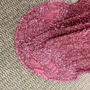 From Mia Bella. Worn once, slight damage to the train. Size US 2